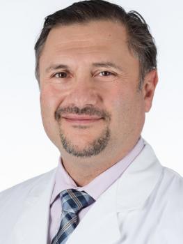 Headshot of Head and Neck Surgeon Oleg Militsakh, MD, of Methodist Estabrook Cancer Center