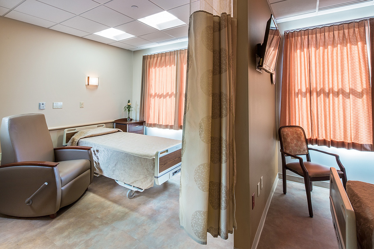 Semiprivate rooms for long-term residents are spacious and include restrooms.