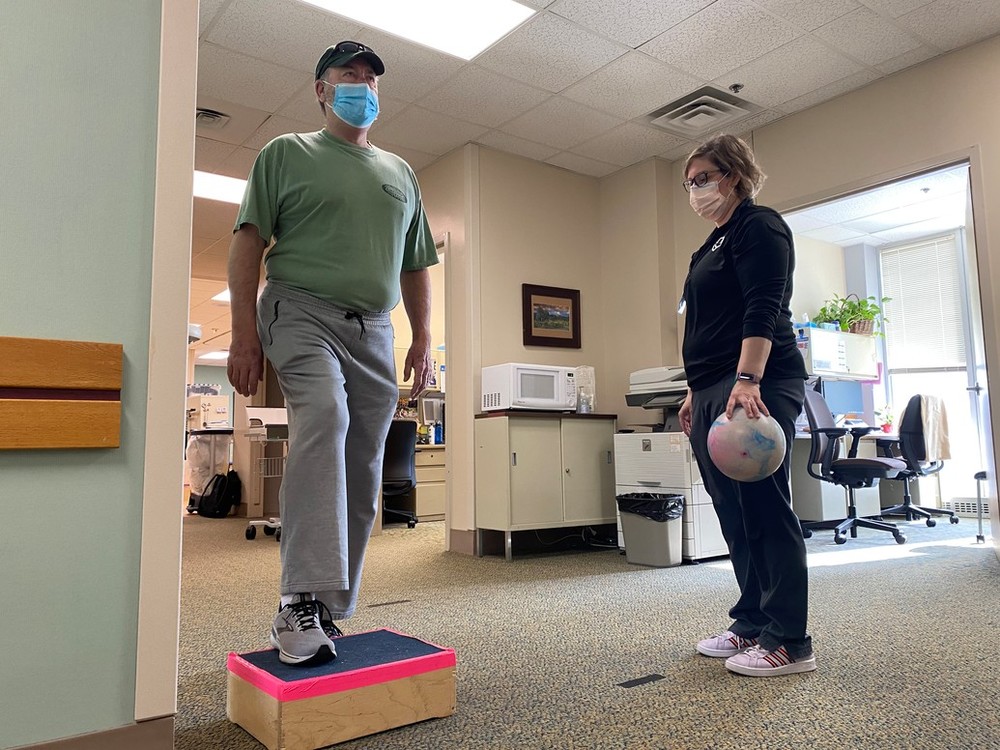 Mark Kitzelman works with specialty physical therapist Jodie Curran, PT, DPT, CLT-LANA, at the Amputee and Gait Rehab clinic at Methodist Hospital on April 26, 2022.