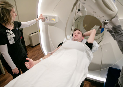 Jake Arnold is prepared for a digital PET scan at Methodist Hospital.