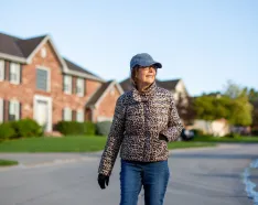 LeAnna MacDonald walking through a local neighborhood
