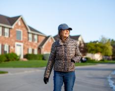 LeAnna MacDonald walking through a local neighborhood