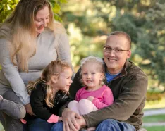 Mike Lambert with his wife and daughters