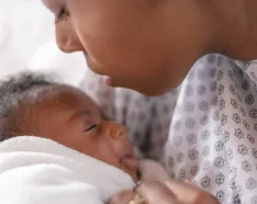 Mother holding newborn