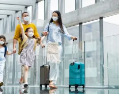 Family traveling in airport