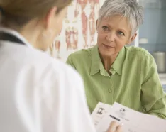 Older woman with doctor