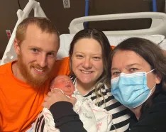 Silas Paul Williams with parents Chelsea and Elijah Williams and Dr. Maureen Boyle