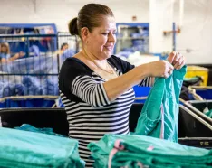 Folding laundry at SSS