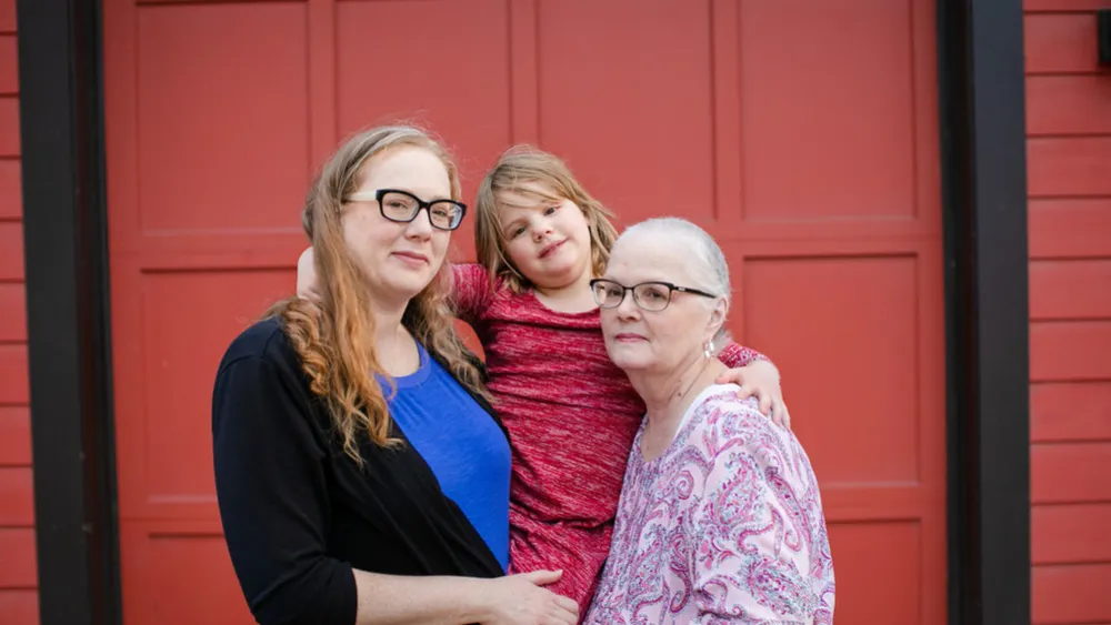 Photo of Amanda Nelson with her daughter Sawyer and Mother Terry