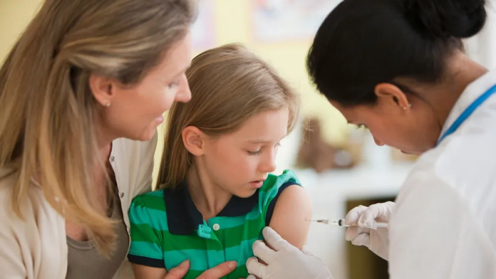 Child getting vaccine