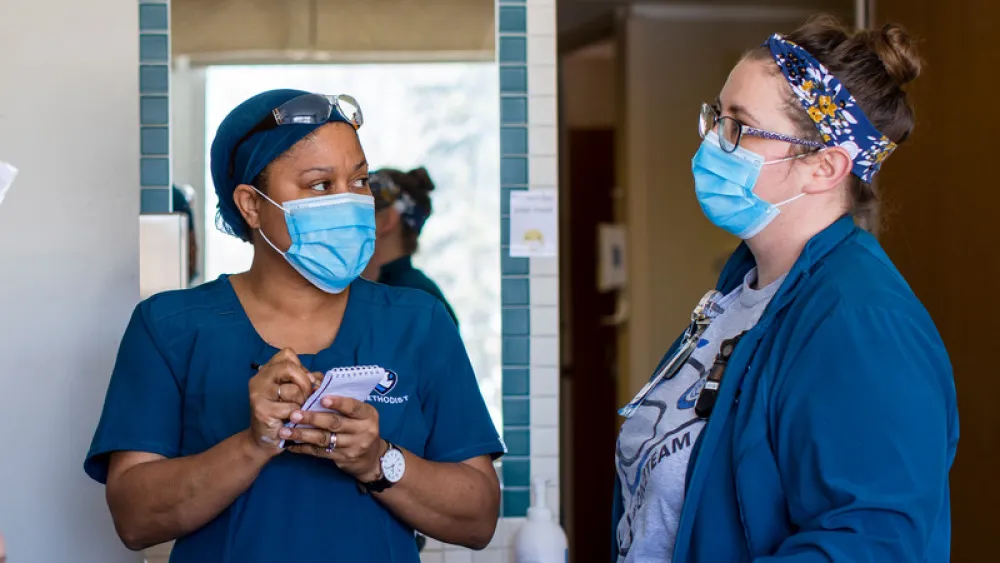 Calandra Cooper, CNA, with preceptor Jen Lane, CNA, at Methodist Hospital.