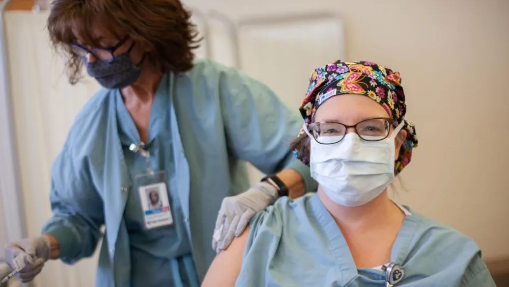 Nurse gets COVID-19 vaccine