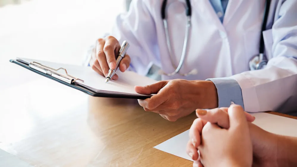 Doctor with clipboard