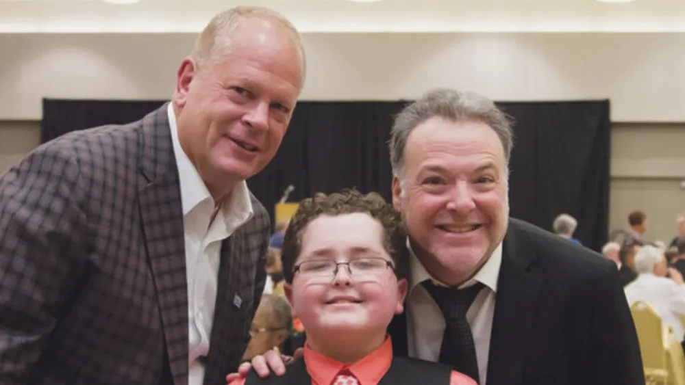 Brady Jorgensen with Council Bluffs Mayor  Matt Walsh and actor Richard Horvitz at  the 2017 Spirit of Courage event