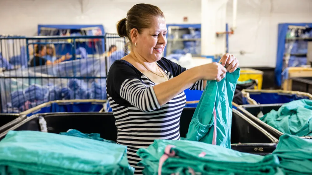 Folding laundry at SSS