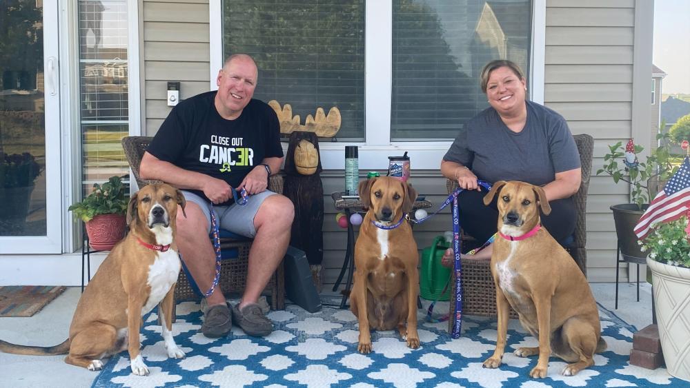 RyAnne Elsesser with her husband, Dave, and their dogs Toby, Blue and Penny.