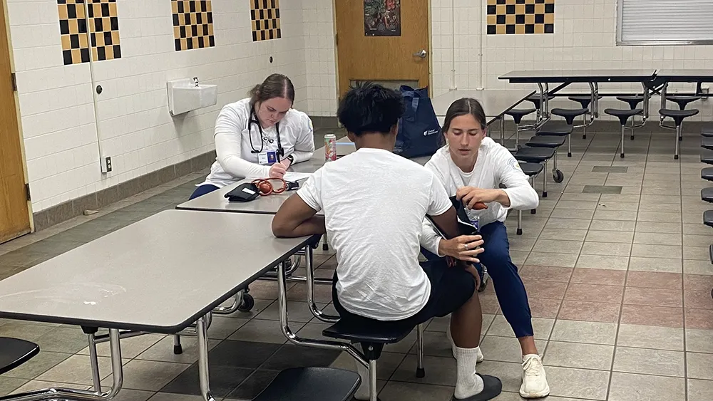 NMC students perform sports physicals at Burke High School