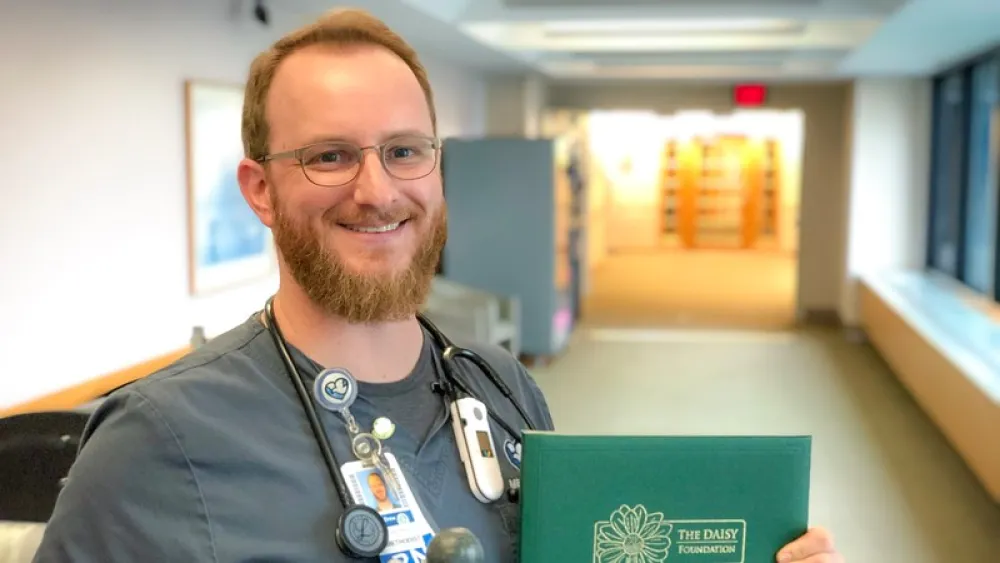 Image for post: Nurse Walks Patient Toward Optimism and Recovery