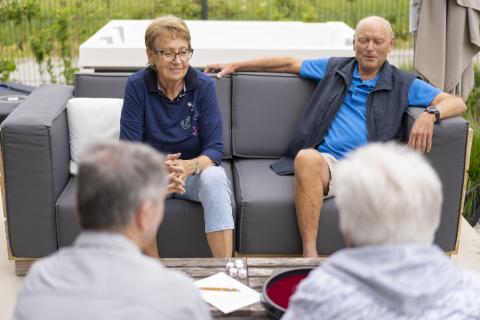 Older adults sitting outside
