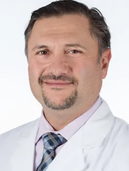 Headshot of Head and Neck Surgeon Oleg Militsakh, MD, of Methodist Estabrook Cancer Center