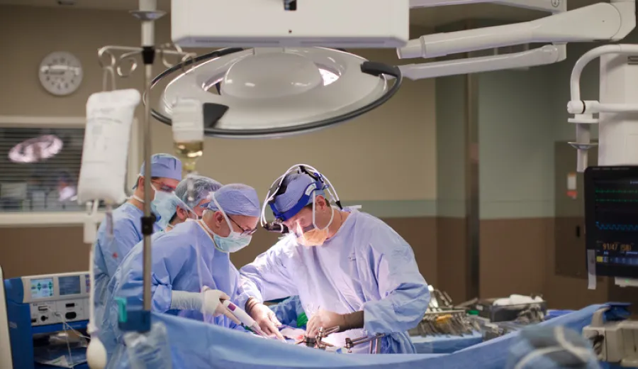 Dr. George Dittrick performs surgery