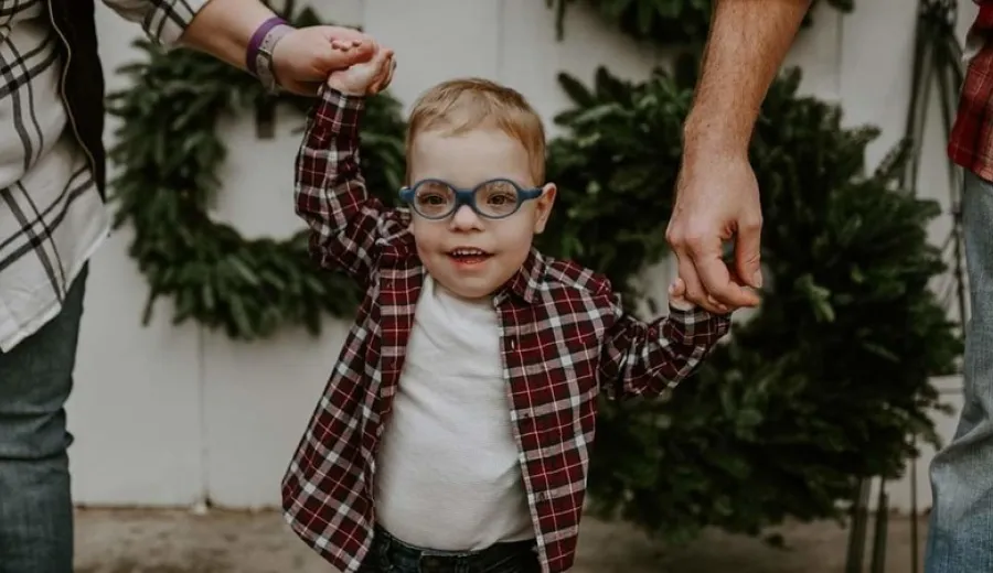 Nathan Teply with his parents