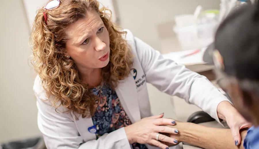 Laura Swartz, RN, cares for Don White during an appointment at Methodist Physicians Clinic Westroads Office Park.