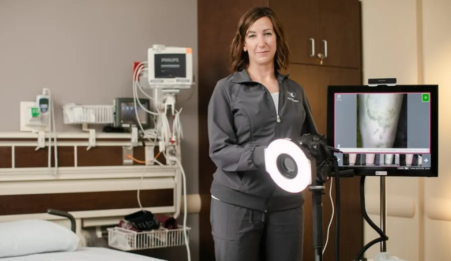 Jen Tran stands in a Methodist emergency room