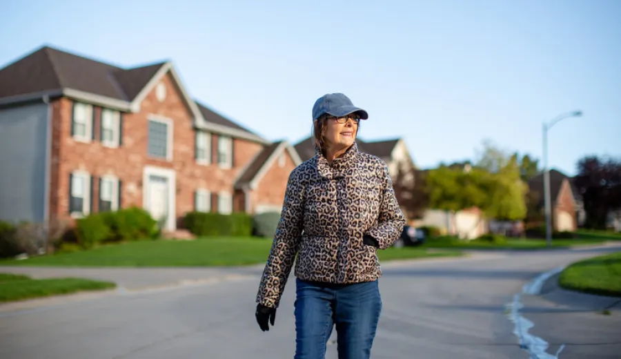 LeAnna MacDonald walking through a local neighborhood