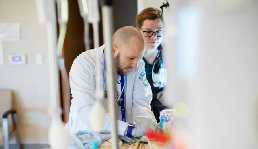 Male nurse works in hospital