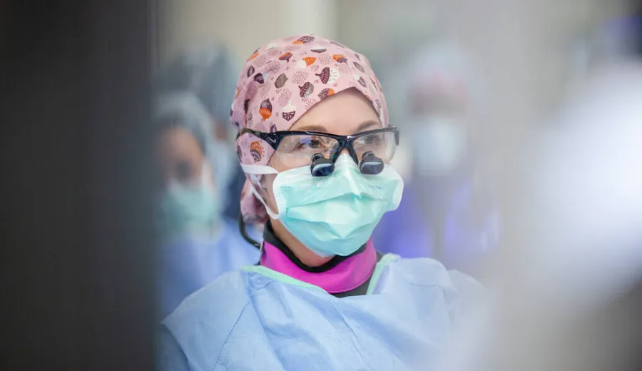 Structural Heart Cardiologist Nidhi Madan, MD performs a TAVR operation with Charles Olson, MD and Cardiothoracic Surgeon HelenMari Merritt-Genore, DO in a Cath Lab at Methodist Hospital.